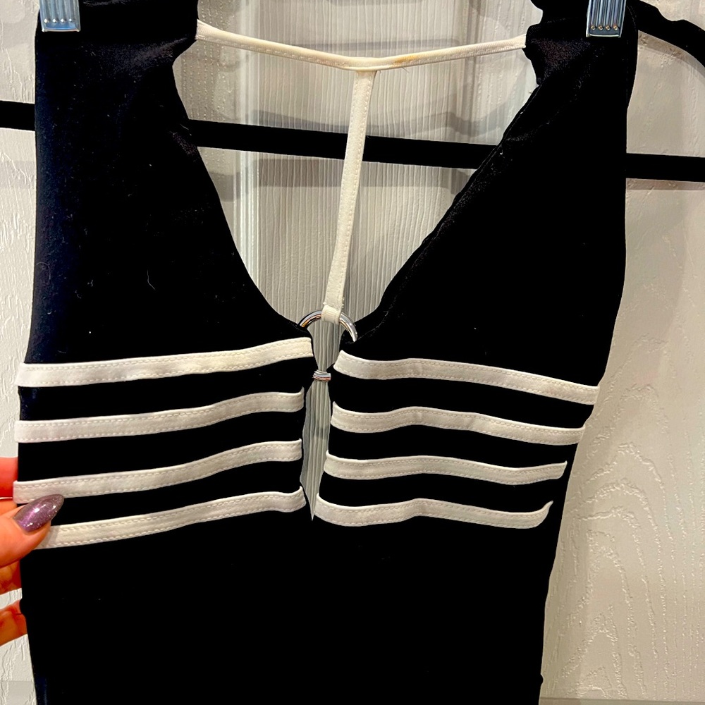 Rio bodysuit size medium black w white piping
